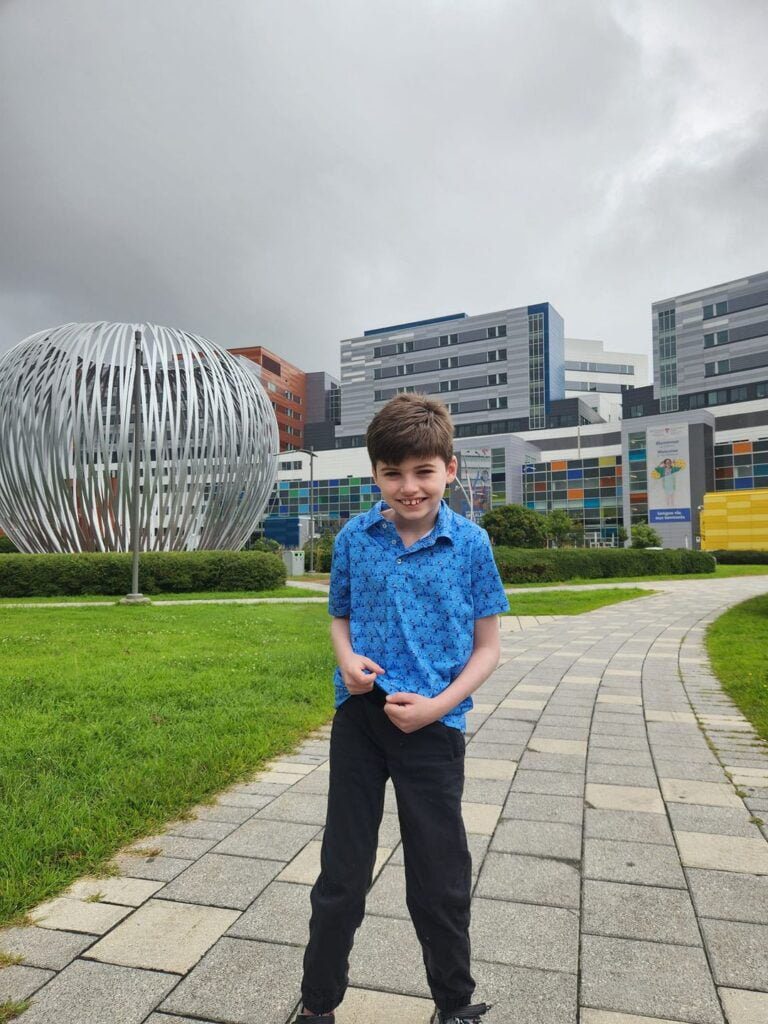 Liam in front of the Montreal Children's Hospital Foundation - Liam Foundation